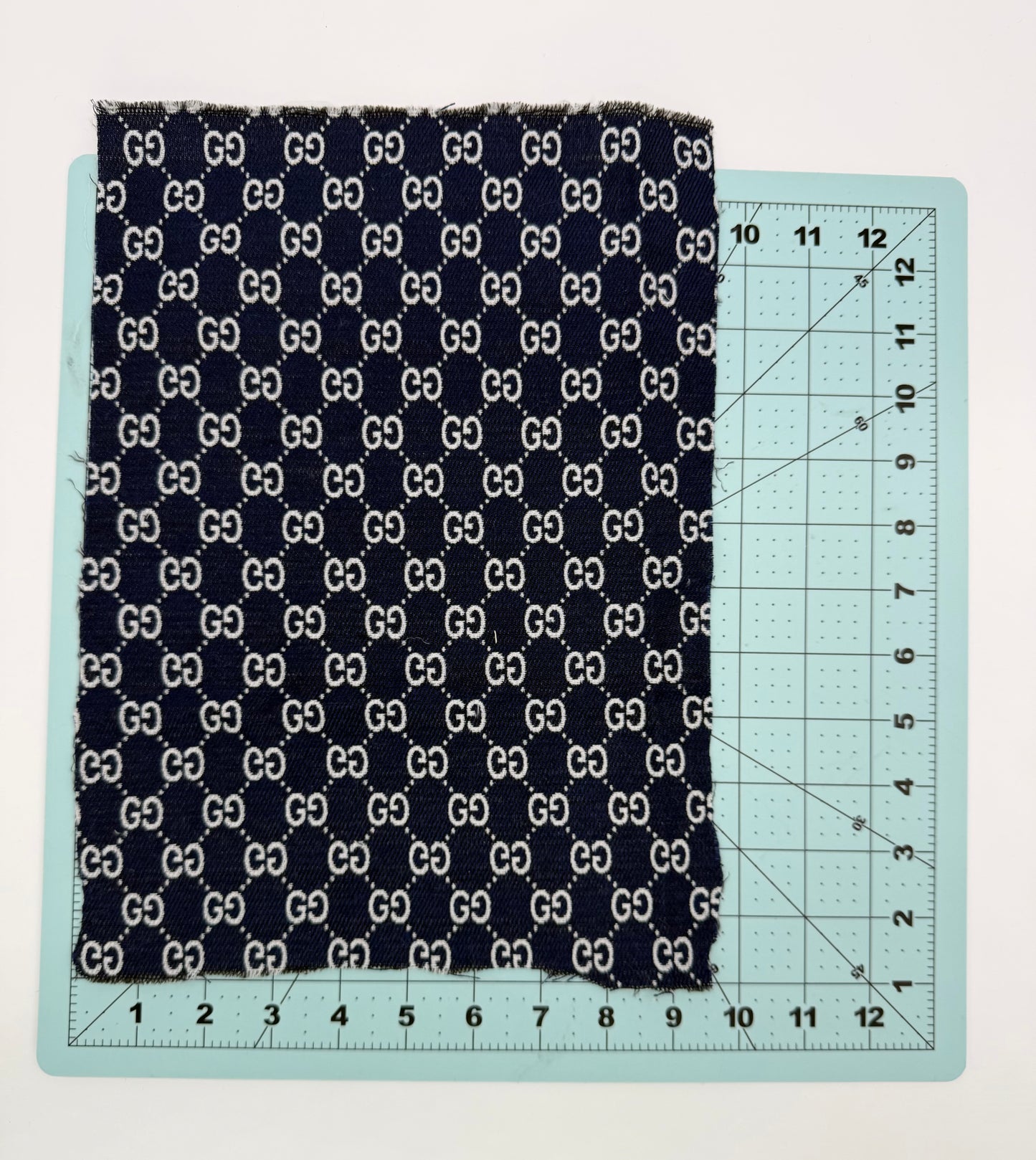 DESIGNER “GUCCI” LOGO FABRIC