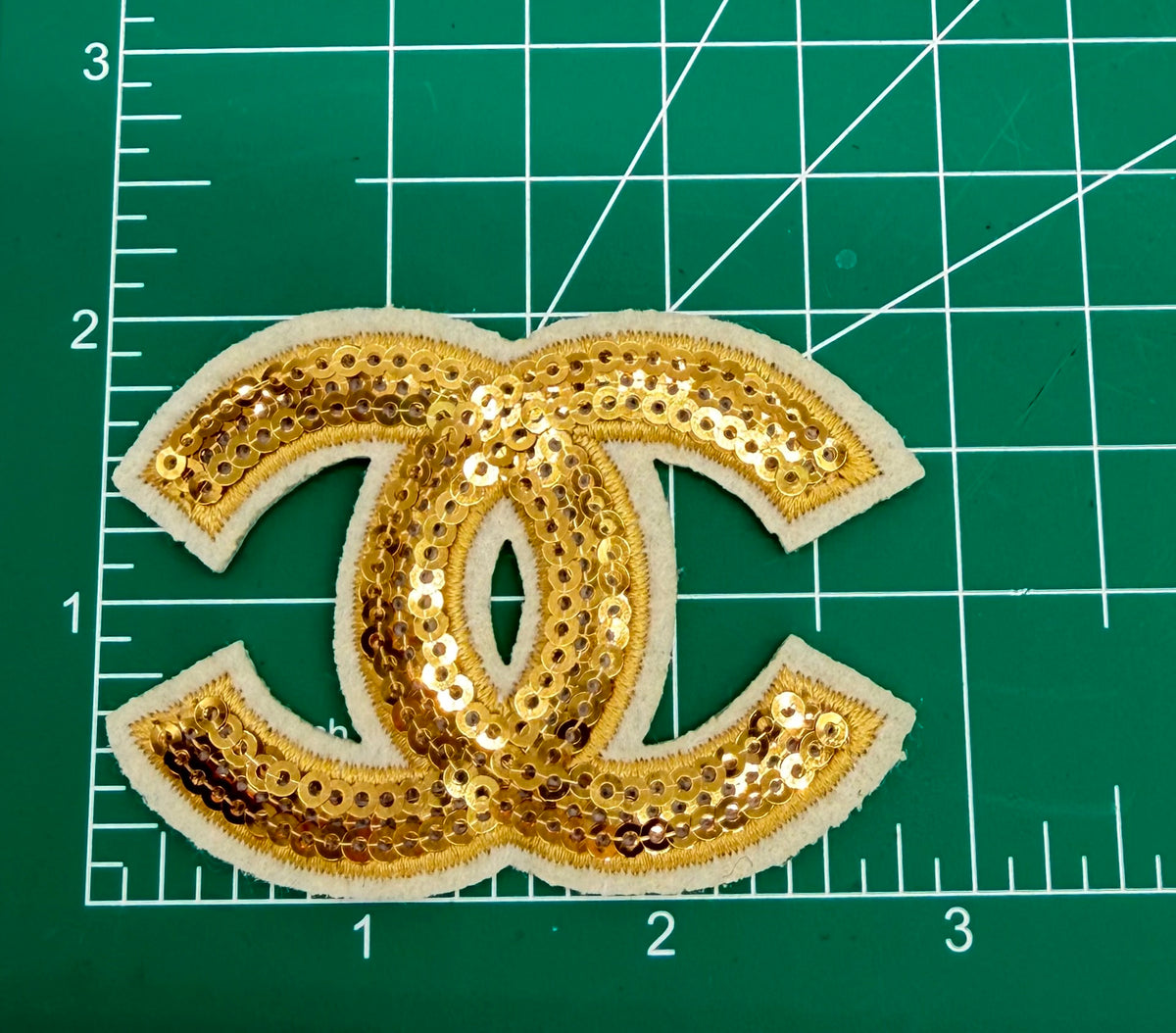 6PC “CHANEL” RED/GLD Patch/brooch set