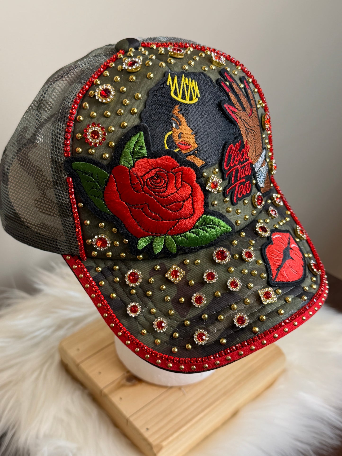 CAMO/RED “CLOCK THAT TEA” JUNK TRUCKER SNAPBACK HAT