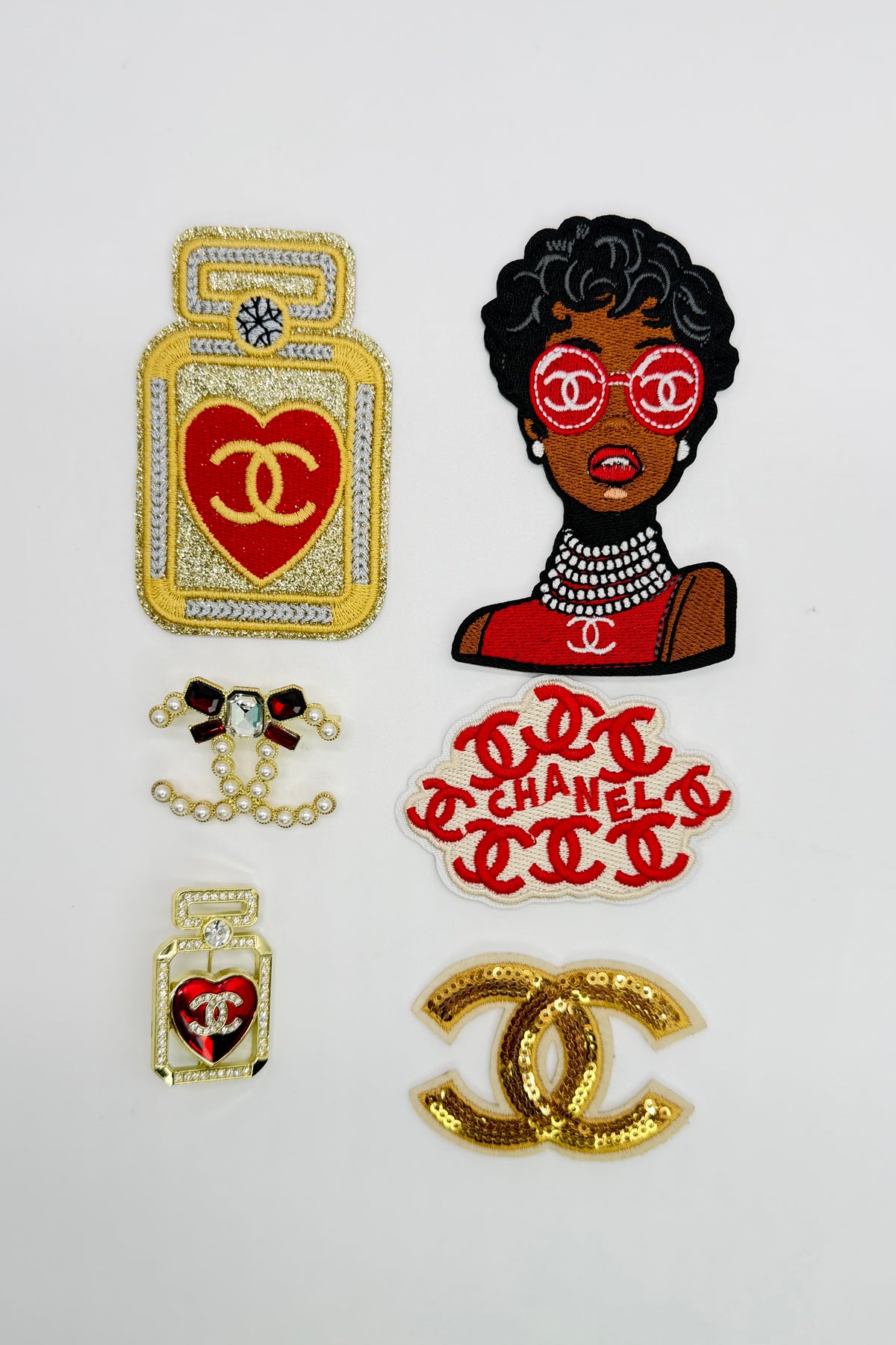 6PC “CHANEL” RED/GLD Patch/brooch set