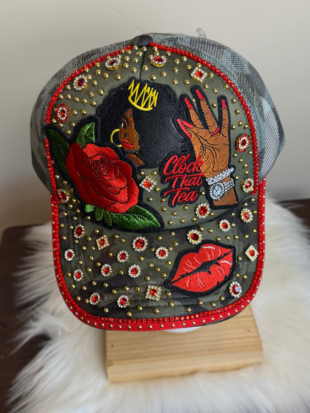 CAMO/RED “CLOCK THAT TEA” JUNK TRUCKER SNAPBACK HAT