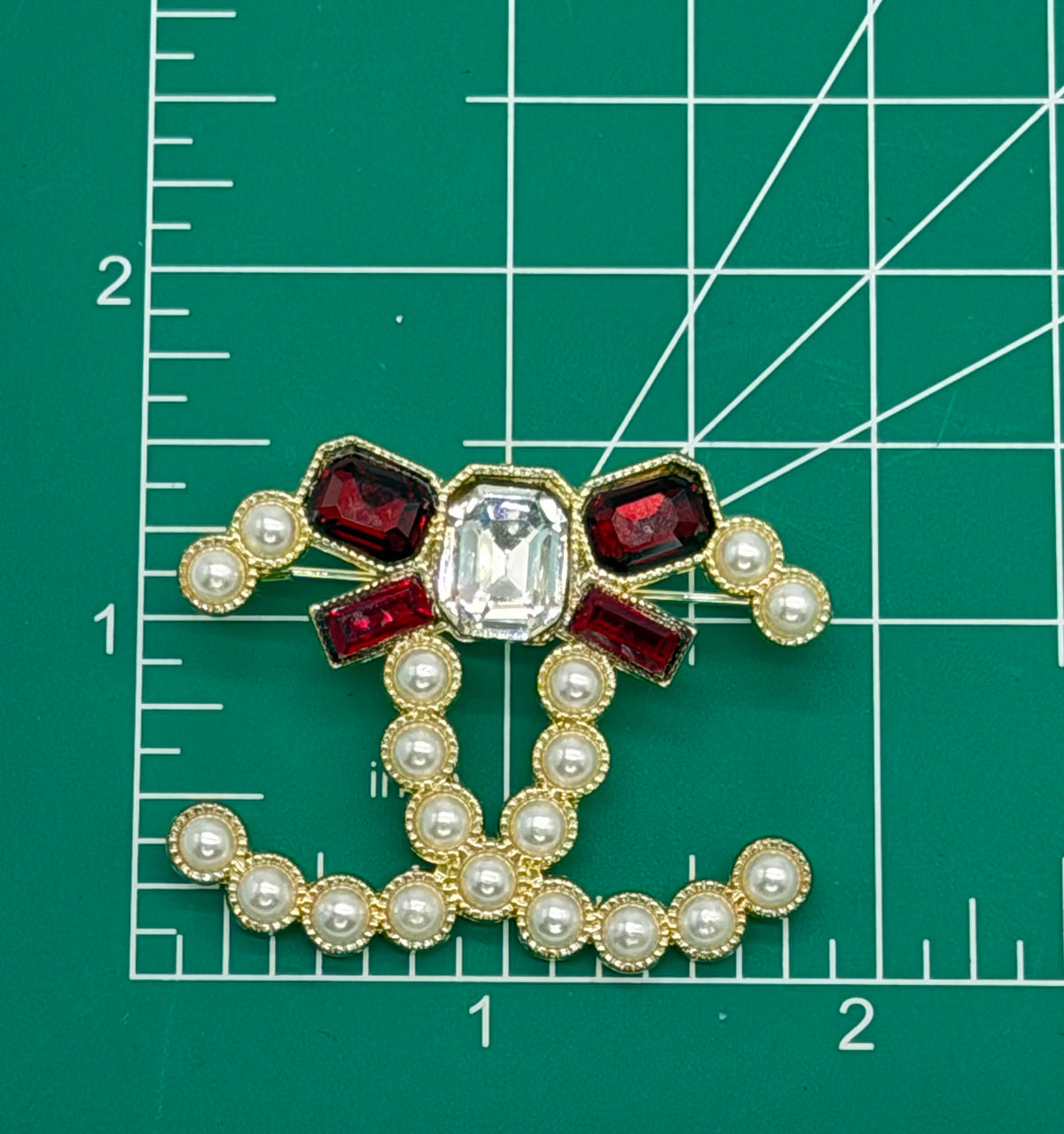 6PC “CHANEL” RED/GLD Patch/brooch set