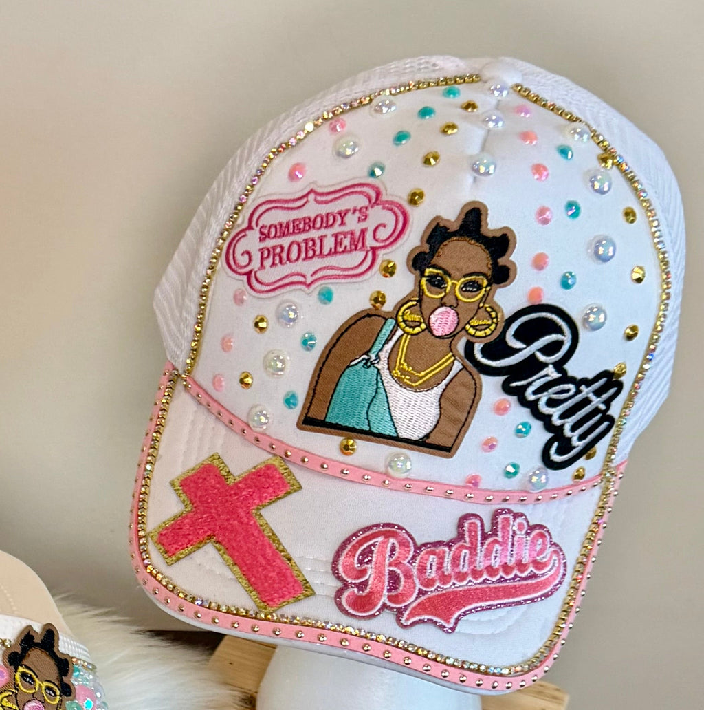 SOMEBODY’S PROBLEM MINT & BUBBLEGUM TRUCKER HAT