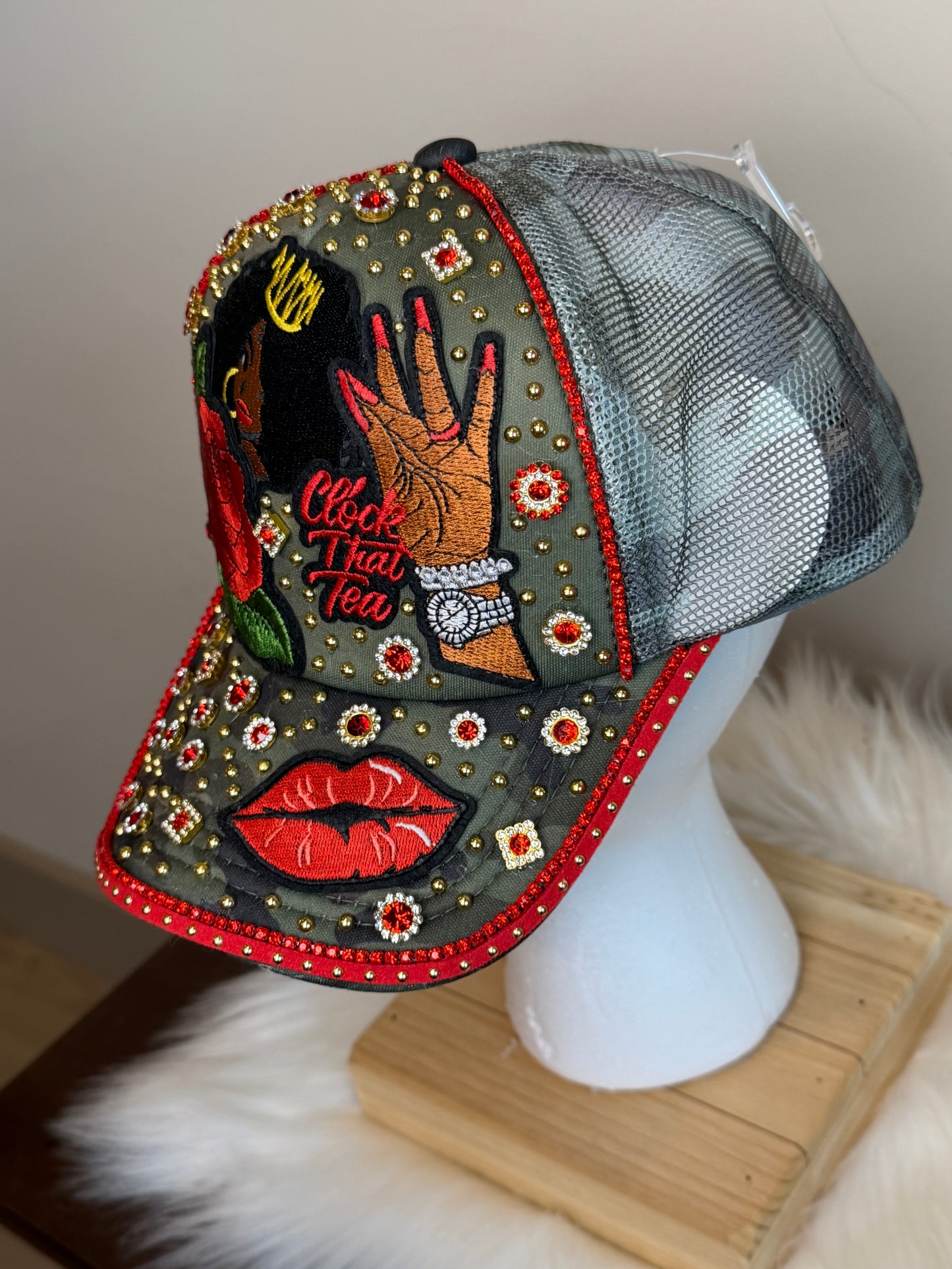 CAMO/RED “CLOCK THAT TEA” JUNK TRUCKER SNAPBACK HAT