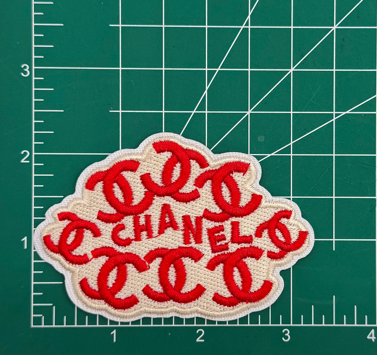 6PC “CHANEL” RED/GLD Patch/brooch set